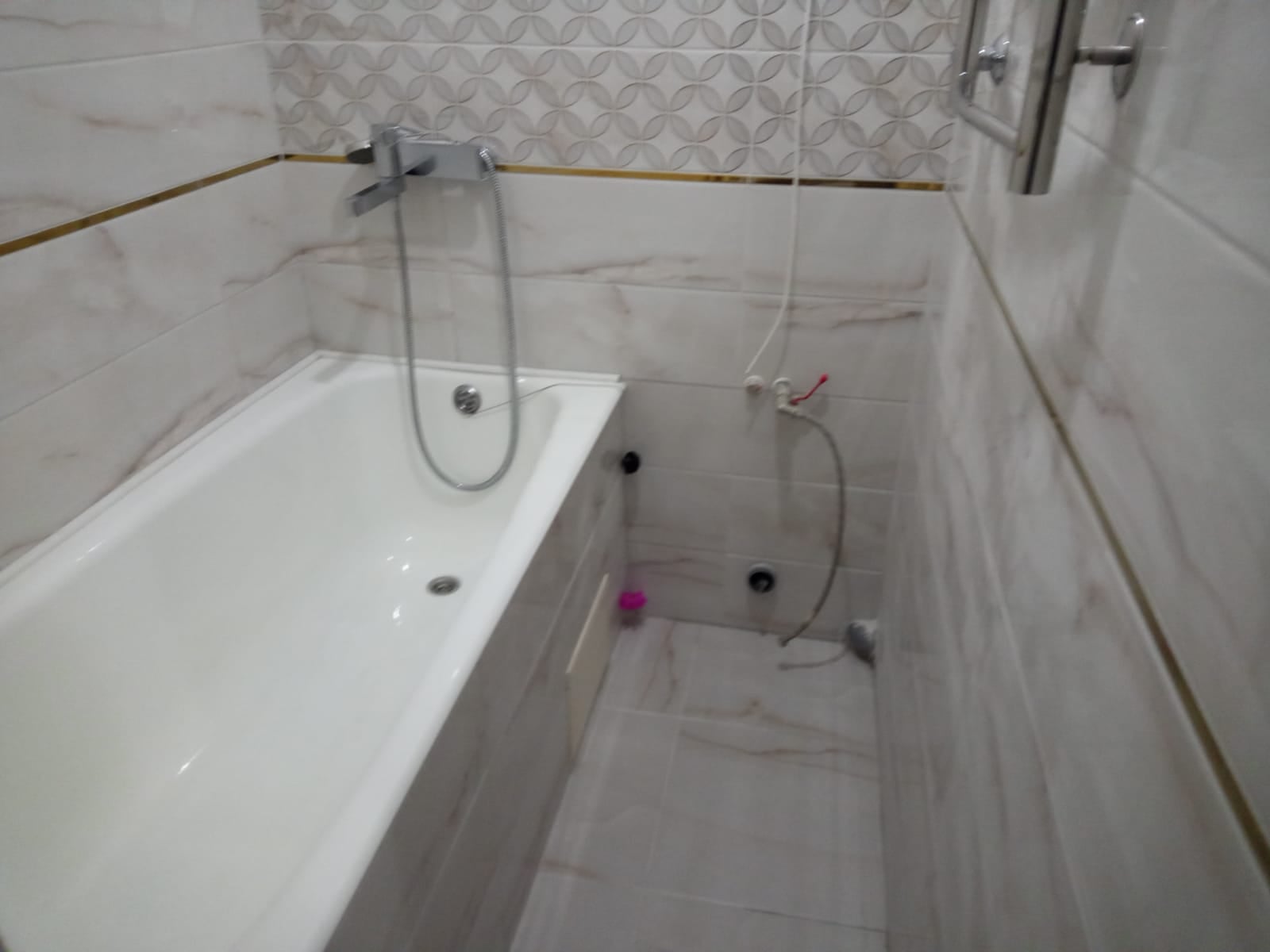Ремонт плиткой (ванна и санузел)– фото после проведения работ